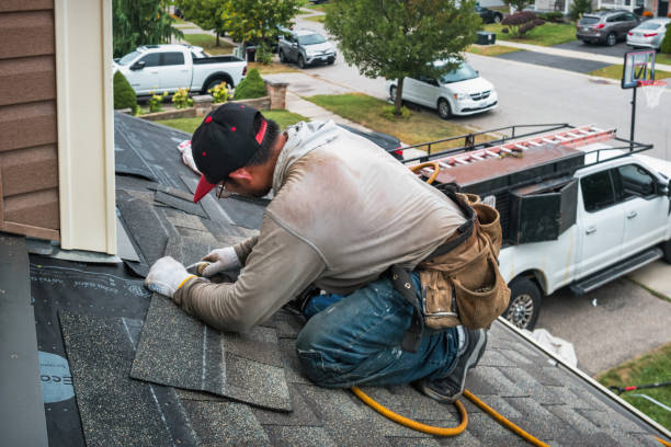 Professional Gutter Repair And Installation technician working in Bennington, IN
